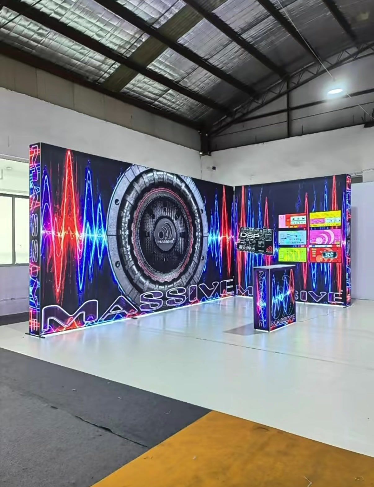 Backlit SEG fabric print on an LED lightbox display wall in Singapore